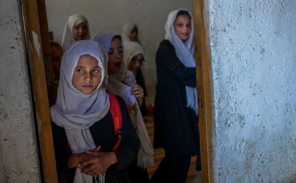 Girls gather at a gender-segregated school in Kabul on Sept. 15. When older secondary students returned to classes, female students were told to wait. Girls gather at a gender-segregated school in Kabul on Sept. 15. When older secondary students returned to classes, female students were told to wait.