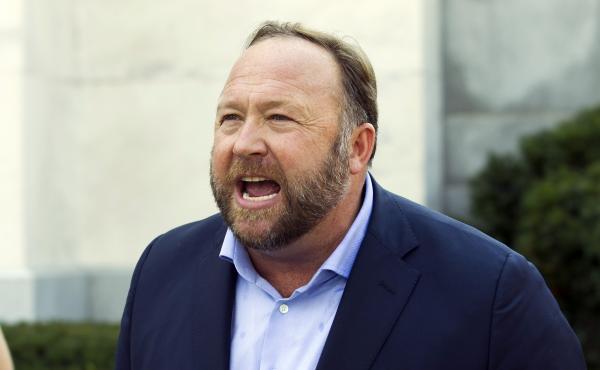 Infowars host and conspiracy theorist Alex Jones speaks in Washington, D.C., on Sept. 5, 2018. A Texas judge on Wednesday pushed back a trial over how much Jones should pay the families of Sandy Hook victims. Infowars host and conspiracy theorist Alex Jones speaks in Washington, D.C., on Sept. 5, 2018. A Texas judge on Wednesday pushed back a trial over how much Jones should pay the families of Sandy Hook victims.