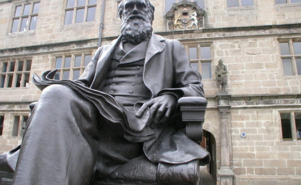 Darwin sits in front of Shrewsbury Library in England, which was formerly a school he attended. Darwin sits in front of Shrewsbury Library in England, which was formerly a school he attended.