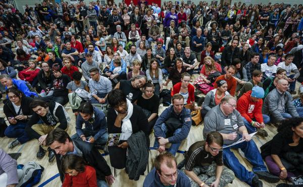 Colorado Democrats pack a gym at a Denver high school during caucuses on March 1, 2016. The crowds and long lines have led to calls for the state to move to an open primary system. Colorado Democrats pack a gym at a Denver high school during caucuses on March 1, 2016. The crowds and long lines have led to calls for the state to move to an open primary system.
