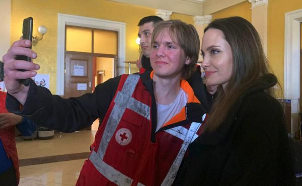 Angelina Jolie, Hollywood movie star and UNHCR goodwill ambassador, poses Saturday for photo with her fans in Lviv, Ukraine. Angelina Jolie, Hollywood movie star and UNHCR goodwill ambassador, poses Saturday for photo with her fans in Lviv, Ukraine.