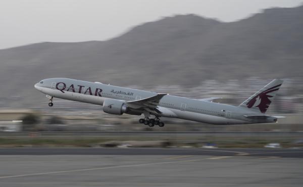 In this Sept. 9, 2021, photo, a Qatar Airways aircraft takes off with foreigners from the airport in Kabul, Afghanistan. In this Sept. 9, 2021, photo, a Qatar Airways aircraft takes off with foreigners from the airport in Kabul, Afghanistan.