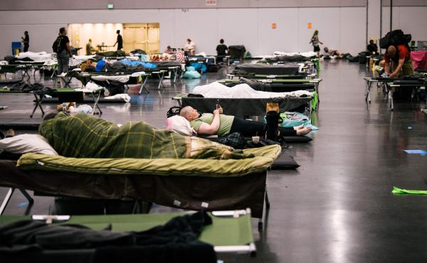 People rest at the Oregon Convention Center cooling station in Oregon, Portland on June 28, 2021, as a heatwave moves over much of the United States. People rest at the Oregon Convention Center cooling station in Oregon, Portland on June 28, 2021, as a heatwave moves over much of the United States.