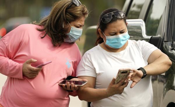 Women wear masks in Houston Wednesday. Harris County requires any business providing goods or services to require all employees and visitors to wear face coverings in areas of close proximity to co-workers or the public, at least through Aug. 26. Women wear masks in Houston Wednesday. Harris County requires any business providing goods or services to require all employees and visitors to wear face coverings in areas of close proximity to co-workers or the public, at least through Aug. 26.