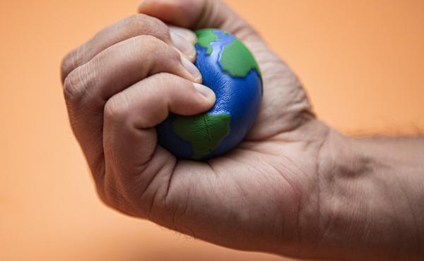 The climate crisis is here, and if you feel climate anxiety that's a totally normal response. Life Kit walks you through ways to address those feelings. The image shows a hand squeezing a stress ball that looks like planet Earth. The climate crisis is here, and if you feel climate anxiety that's a totally normal response. Life Kit walks you through ways to address those feelings. The image shows a hand squeezing a stress ball that looks like planet Earth.