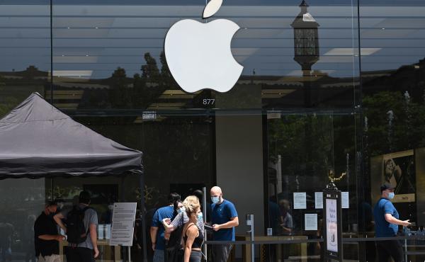 People enter an Apple Store at in Glendale, Calif., on June 23.The second-highest court in the European Union says Ireland's tax break for Apple did not represent an unfair advantage. People enter an Apple Store at in Glendale, Calif., on June 23.The second-highest court in the European Union says Ireland's tax break for Apple did not represent an unfair advantage.