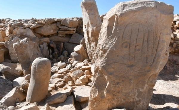 This photo shows two carved standing stones at a remote Neolithic site in Jordan's eastern desert. A team of Jordanian and French archaeologists said Tuesday that it had found a roughly 9,000-year-old shrine. This photo shows two carved standing stones at a remote Neolithic site in Jordan's eastern desert. A team of Jordanian and French archaeologists said Tuesday that it had found a roughly 9,000-year-old shrine.