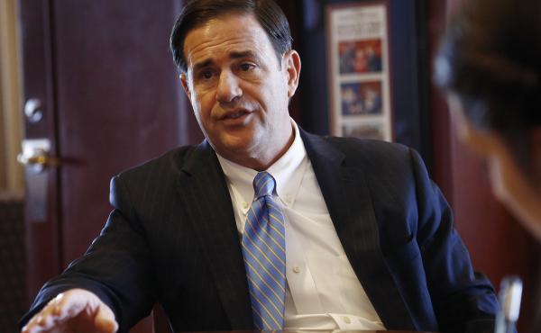 Republican Gov. Doug Ducey speaks about a variety of issues during an interview in his office at the Arizona Capitol in May 2018, in Phoenix. Republican Gov. Doug Ducey speaks about a variety of issues during an interview in his office at the Arizona Capitol in May 2018, in Phoenix.