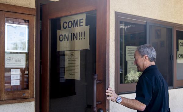 Fume Bistro owner Terry Letson enters his restaurant in Napa, Calif., on Tuesday. A handful of businesses in Napa have made the decision to begin reopening their dining rooms with occupancy limits Fume Bistro owner Terry Letson enters his restaurant in Napa, Calif., on Tuesday. A handful of businesses in Napa have made the decision to begin reopening their dining rooms with occupancy limits