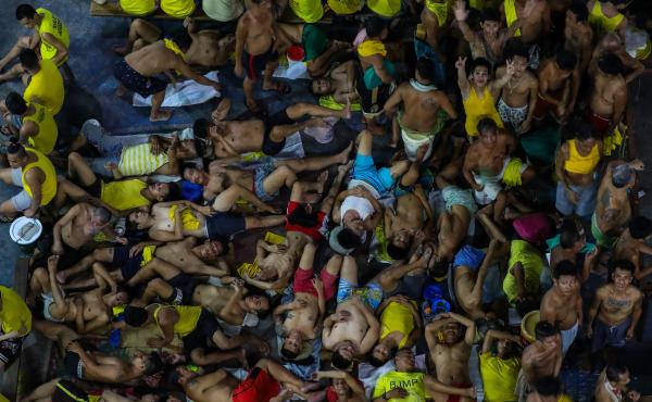 Prison inmates gather in cramped conditions in Manila's Quezon City Jail. Guards and inmates at the notoriously overcrowded Philippine jail tested positive for the COVID-19 coronavirus, officials said last month, sparking urgent calls for the release of s Prison inmates gather in cramped conditions in Manila's Quezon City Jail. Guards and inmates at the notoriously overcrowded Philippine jail tested positive for the COVID-19 coronavirus, officials said last month, sparking urgent calls for the release of s