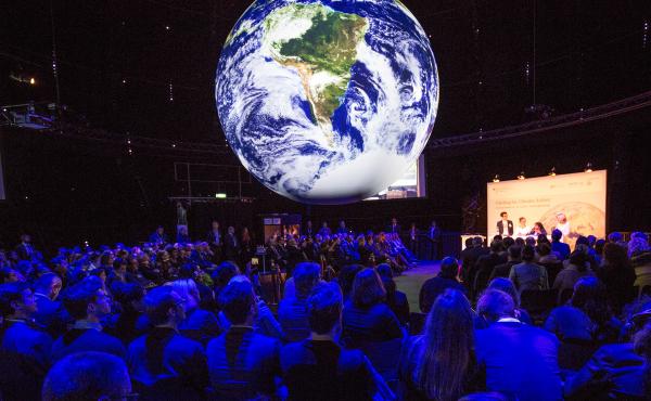 Climate conference attendees in Bonn, Germany, see a representation of Earth's climate trends. Climate conference attendees in Bonn, Germany, see a representation of Earth's climate trends.