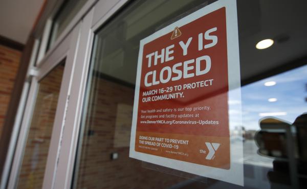 The YMCA is among several national groups asking Congress for $60 billion in emergency funding to nonprofit organizations nationwide. Above, a sign hangs on the door of the Schlessmann YMCA in Denver, Colo., on March 16, 2020. The YMCA is among several national groups asking Congress for $60 billion in emergency funding to nonprofit organizations nationwide. Above, a sign hangs on the door of the Schlessmann YMCA in Denver, Colo., on March 16, 2020.