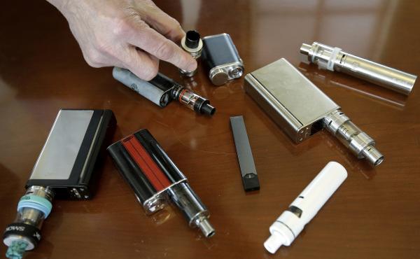 Vaping devices now come in many shapes and sizes; these were confiscated from students by a high school principal in Massachusetts in 2018. Vaping devices now come in many shapes and sizes; these were confiscated from students by a high school principal in Massachusetts in 2018.