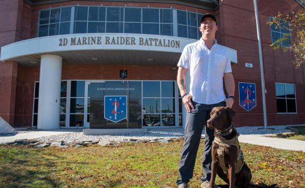Nick Jones at Marine Corps Base Camp Lejeune in Jacksonville, N.C., on Nov. 8 with his dog Fletcher. This Veterans Day will be Nick's first day as a civilian upon leaving the Marine Corps. Nick Jones at Marine Corps Base Camp Lejeune in Jacksonville, N.C., on Nov. 8 with his dog Fletcher. This Veterans Day will be Nick's first day as a civilian upon leaving the Marine Corps.