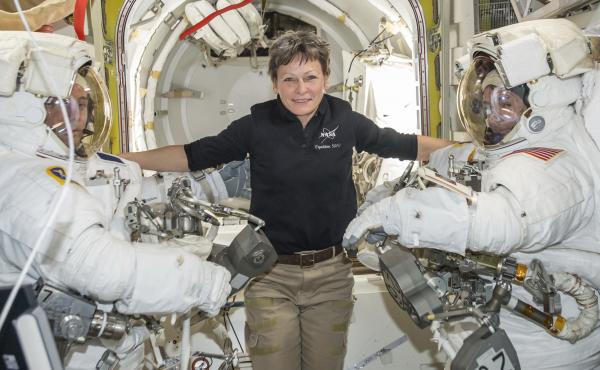Astronaut Peggy Whitson became NASA's astronaut with the most time in orbit Monday. She is seen here earlier this year, along with fellow astronauts, in the Quest airlock of the International Space Station. Astronaut Peggy Whitson became NASA's astronaut with the most time in orbit Monday. She is seen here earlier this year, along with fellow astronauts, in the Quest airlock of the International Space Station.
