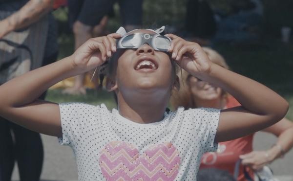 A child in Charlottesville, Va., uses eclipse glasses to safely watch the August 2017 solar eclipse. A child in Charlottesville, Va., uses eclipse glasses to safely watch the August 2017 solar eclipse.