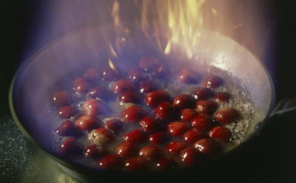Archivist Amy McDonald invited some co-workers to help her re-create cherries jubilee from a university cookbook. But even with a historical paper trail, there were still things they couldn't figure out, like what to do after it starts flaming. Archivist Amy McDonald invited some co-workers to help her re-create cherries jubilee from a university cookbook. But even with a historical paper trail, there were still things they couldn't figure out, like what to do after it starts flaming.