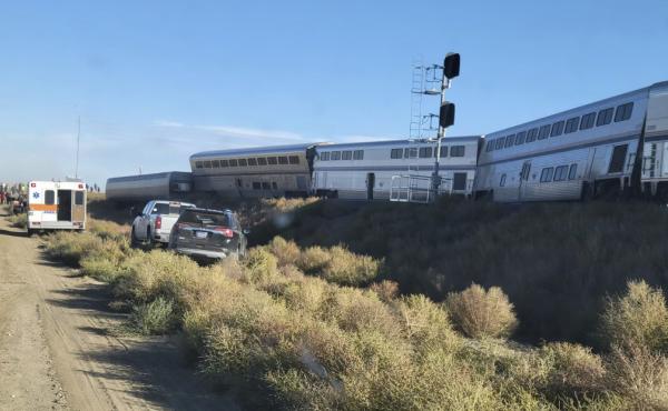 An ambulance is parked at the scene of an Amtrak train derailment on Saturday, in north-central Montana. An ambulance is parked at the scene of an Amtrak train derailment on Saturday, in north-central Montana.