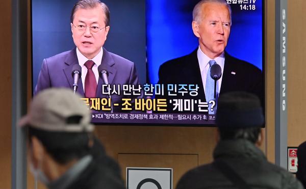 People in Seoul watch a news report in November on the U.S. election, showing images of Joe Biden, newly elected as president, and South Korean President Moon Jae-in. People in Seoul watch a news report in November on the U.S. election, showing images of Joe Biden, newly elected as president, and South Korean President Moon Jae-in.