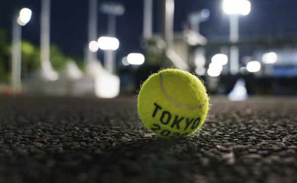 A ball sits outside a court at the Ariake Tennis Park during practice sessions at the Tokyo Olympics on Tuesday. A ball sits outside a court at the Ariake Tennis Park during practice sessions at the Tokyo Olympics on Tuesday.
