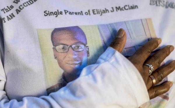 Sheneen McClain stands at the site where her son Elijah was killed after an interaction with Aurora Police officers and paramedics resulted in the 23-year-old being restrained, choked and given a sedative on Aug. 24, 2019. Elijah McClain died less than a Sheneen McClain stands at the site where her son Elijah was killed after an interaction with Aurora Police officers and paramedics resulted in the 23-year-old being restrained, choked and given a sedative on Aug. 24, 2019. Elijah McClain died less than a