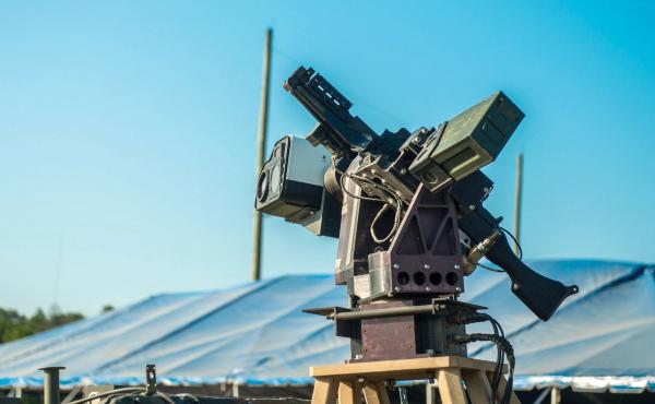 The U.S. Army's Autonomous Remote Engagement System is mounted on the Picatinny Lightweight Remote Weapon System and coupled with an M240B machine gun. It's part of a program that reduces the time to identify targets using automatic target detection and u The U.S. Army's Autonomous Remote Engagement System is mounted on the Picatinny Lightweight Remote Weapon System and coupled with an M240B machine gun. It's part of a program that reduces the time to identify targets using automatic target detection and u