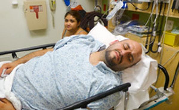 Michael Granillo and his wife Sonia await treatment at an emergency room in Northridge, Calif. Michael Granillo and his wife Sonia await treatment at an emergency room in Northridge, Calif.