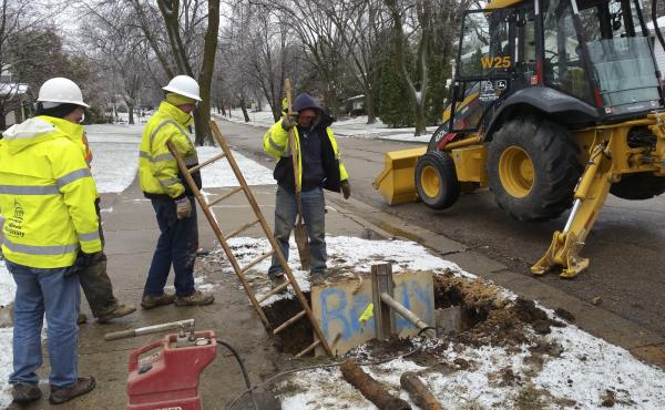 A Madison Water Utility Crew works to dig up and replace a broken water shutoff box in preparation for a larger pipe-lining project. Madison started using copper instead of lead pipes in the late 1920s. A Madison Water Utility Crew works to dig up and replace a broken water shutoff box in preparation for a larger pipe-lining project. Madison started using copper instead of lead pipes in the late 1920s.