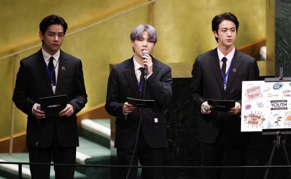 V (from left), Suga and Jin of BTS at the launch of the U.N. General Assembly's 76th session on Monday. The popular boy band from South Korea sang (in a video performance viewed online by more than 1 million) and spoke. V (from left), Suga and Jin of BTS at the launch of the U.N. General Assembly's 76th session on Monday. The popular boy band from South Korea sang (in a video performance viewed online by more than 1 million) and spoke.