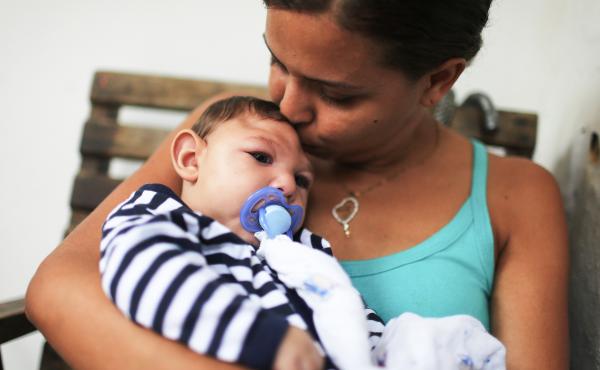 Mother Daniele Santos holds her baby Juan Pedro, who has microcephaly, on May 30, 2016, in Recife, Brazil. Researchers are now learning that Zika's effects can appear up to a year after birth. Mother Daniele Santos holds her baby Juan Pedro, who has microcephaly, on May 30, 2016, in Recife, Brazil. Researchers are now learning that Zika's effects can appear up to a year after birth.