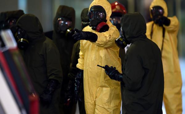 Members of Malaysia's hazardous materials team conduct a decontamination operation at the Kuala Lumpur International Airport on Sunday. Members of Malaysia's hazardous materials team conduct a decontamination operation at the Kuala Lumpur International Airport on Sunday.