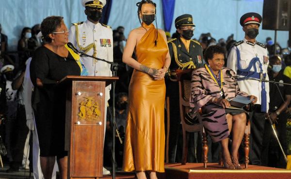 Barbados's Prime Minister Mia Mottley, left, asks the country's new president, Sandra Mason, seated at right, to make Barbadian singer Rihanna the country's 11th National Hero during a ceremony to declare Barbados a republic Tuesday. Barbados's Prime Minister Mia Mottley, left, asks the country's new president, Sandra Mason, seated at right, to make Barbadian singer Rihanna the country's 11th National Hero during a ceremony to declare Barbados a republic Tuesday.
