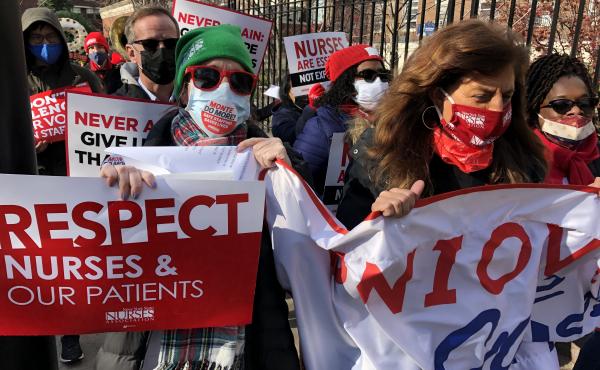Nurses at Montefiore Medical Center in New York City protest what they say is a staff shortage at several of the network's hospitals in the Bronx and nearby suburbs. During the Nov. 19 demonstration they walked from the hospital to a nearby cemetery. Nurses at Montefiore Medical Center in New York City protest what they say is a staff shortage at several of the network's hospitals in the Bronx and nearby suburbs. During the Nov. 19 demonstration they walked from the hospital to a nearby cemetery.