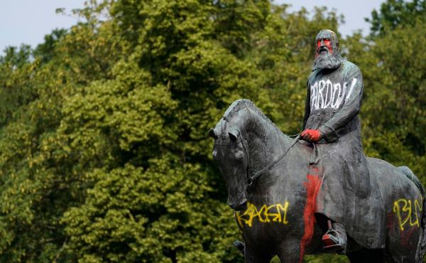 A statue of King Leopold II stands defaced after protests this month in Brussels. Belgian King Philippe acknowledged "acts of violence and cruelty" in his country's colonial past in Africa. A statue of King Leopold II stands defaced after protests this month in Brussels. Belgian King Philippe acknowledged "acts of violence and cruelty" in his country's colonial past in Africa.
