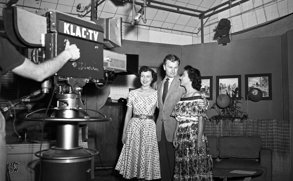 Betty White (left) stands alongside actor Eddie Albert in front of the a KLAC-TV camera during a broadcast of the live talk show, 'Hollywood on Television,' in 1952. Betty White (left) stands alongside actor Eddie Albert in front of the a KLAC-TV camera during a broadcast of the live talk show, 'Hollywood on Television,' in 1952.