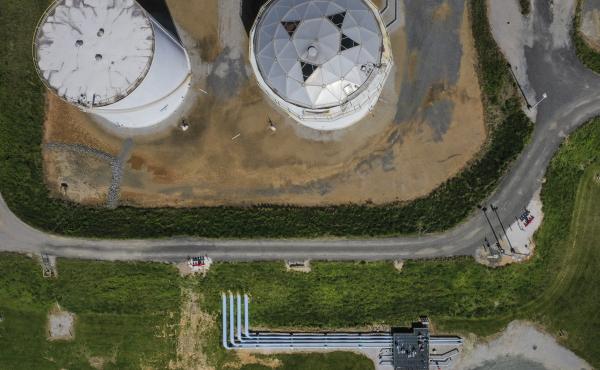 Fuel holding tanks are pictured at Colonial Pipeline's Dorsey Junction Station in Woodbine, Maryland in May 2021, the month that a cyberattack disrupted gas supply to the eastern U.S. for several days. Fuel holding tanks are pictured at Colonial Pipeline's Dorsey Junction Station in Woodbine, Maryland in May 2021, the month that a cyberattack disrupted gas supply to the eastern U.S. for several days.