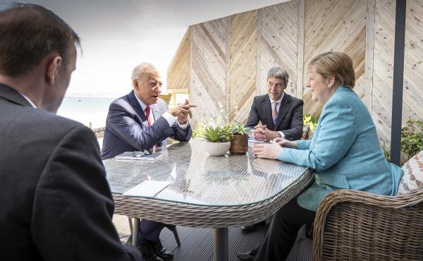 President Biden meets with German Chancellor Angela Merkel on the sidelines of the G-7 summit. A White House official said Biden did a lot of "diplomatic speed-dating" with world leaders. President Biden meets with German Chancellor Angela Merkel on the sidelines of the G-7 summit. A White House official said Biden did a lot of "diplomatic speed-dating" with world leaders.