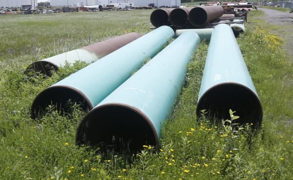 Pipeline used to carry crude oil is shown at the Superior, Wis., terminal of Enbridge Energy, on June 29, 2018. The Biden administration is restoring federal regulations guiding environmental reviews of major infrastructure projects. Pipeline used to carry crude oil is shown at the Superior, Wis., terminal of Enbridge Energy, on June 29, 2018. The Biden administration is restoring federal regulations guiding environmental reviews of major infrastructure projects.