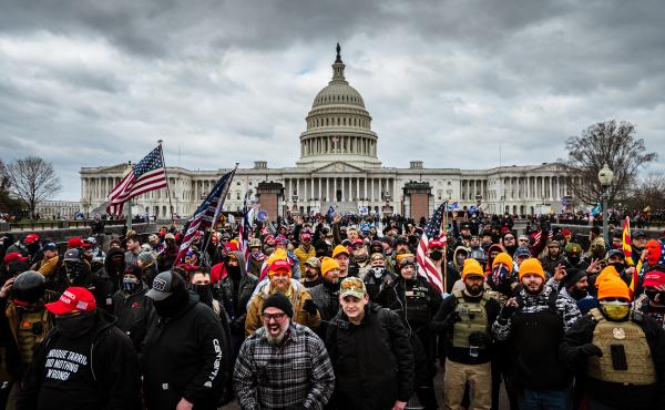 Pro-Trump protesters gather in front of the U.S. Capitol Building on January 6, 2021 in Washington, DC. A pro-Trump mob stormed the Capitol, breaking windows and clashing with police officers. Pro-Trump protesters gather in front of the U.S. Capitol Building on January 6, 2021 in Washington, DC. A pro-Trump mob stormed the Capitol, breaking windows and clashing with police officers.