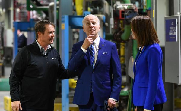 President Biden speaks with Democratic Rep. Cindy Axne of Iowa, right, and Jack Mitchell, regional vice president of POET Bioprocessing during a visit to its plant in Menlo, Iowa, where he announced the EPA would ease restrictions on fuel containing E15 e President Biden speaks with Democratic Rep. Cindy Axne of Iowa, right, and Jack Mitchell, regional vice president of POET Bioprocessing during a visit to its plant in Menlo, Iowa, where he announced the EPA would ease restrictions on fuel containing E15 e