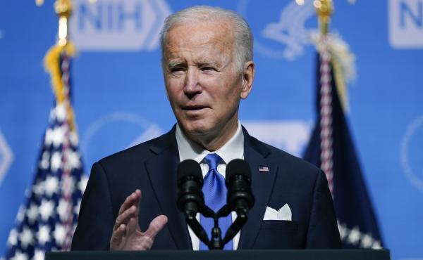 President Joe Biden speaks about new steps to combat COVID-19 surges this winter during a visit to the National Institutes of Health on Dec. 2, 2021, in Bethesda, Md. President Joe Biden speaks about new steps to combat COVID-19 surges this winter during a visit to the National Institutes of Health on Dec. 2, 2021, in Bethesda, Md.