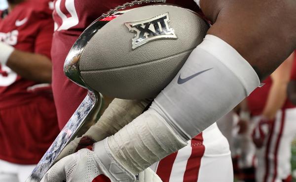 The Big 12 says its schools will start playing their conference games in late September, under a schedule that's been reduced due to the coronavirus. The conference hopes to hold a championship game in December. The Big 12 says its schools will start playing their conference games in late September, under a schedule that's been reduced due to the coronavirus. The conference hopes to hold a championship game in December.