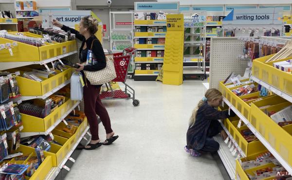 People shop for school supplies at a Target store in Miami, Fla., on July 27. People shop for school supplies at a Target store in Miami, Fla., on July 27.