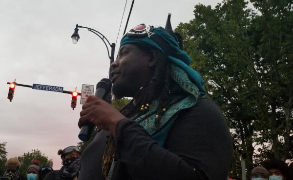 Poet and activist Christopher Coles addresses a crowd in Rochester, N.Y. His message to white protesters is a reminder: "For some of you all that come here, you come because it's an elective. We come because it's survival." Poet and activist Christopher Coles addresses a crowd in Rochester, N.Y. His message to white protesters is a reminder: "For some of you all that come here, you come because it's an elective. We come because it's survival."