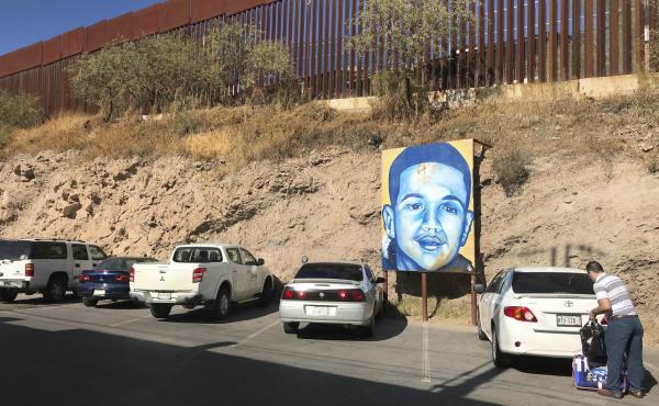 A portrait of 16-year-old Mexican youth Jose Antonio Elena Rodriguez, who was shot and killed in Nogales, Sonora, Mexico, is displayed on the Nogales street where he was killed that runs parallel with the U.S. border. A portrait of 16-year-old Mexican youth Jose Antonio Elena Rodriguez, who was shot and killed in Nogales, Sonora, Mexico, is displayed on the Nogales street where he was killed that runs parallel with the U.S. border.