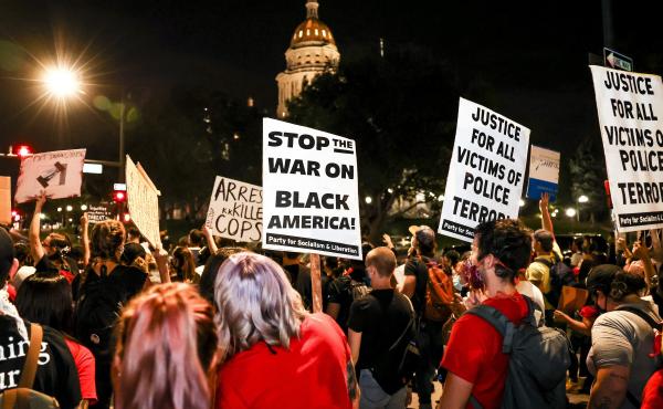 People protest the grand jury decision in the Breonna Taylor case in front of the Colorado state Capitol in Denver on Wednesday. As the protest was breaking up, a motorist drove through a small crowd of protesters who had yelled at the driver to turn arou People protest the grand jury decision in the Breonna Taylor case in front of the Colorado state Capitol in Denver on Wednesday. As the protest was breaking up, a motorist drove through a small crowd of protesters who had yelled at the driver to turn arou