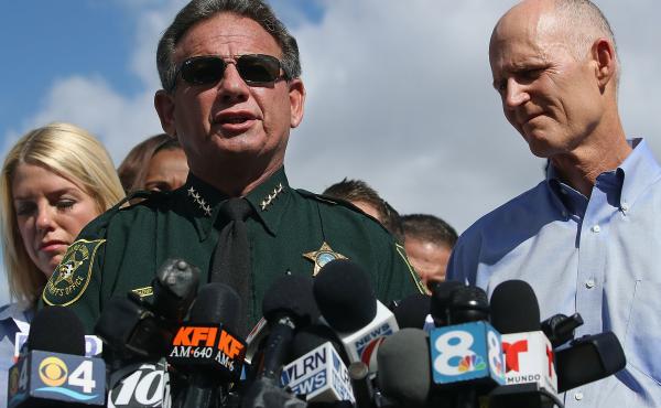 Some Republican lawmakers in Florida are calling on Gov. Rick Scott to remove Broward Sheriff Scott Israel. The sheriff (center) and Scott (right) are seen here on Feb. 15, the day after the shooting. Some Republican lawmakers in Florida are calling on Gov. Rick Scott to remove Broward Sheriff Scott Israel. The sheriff (center) and Scott (right) are seen here on Feb. 15, the day after the shooting.