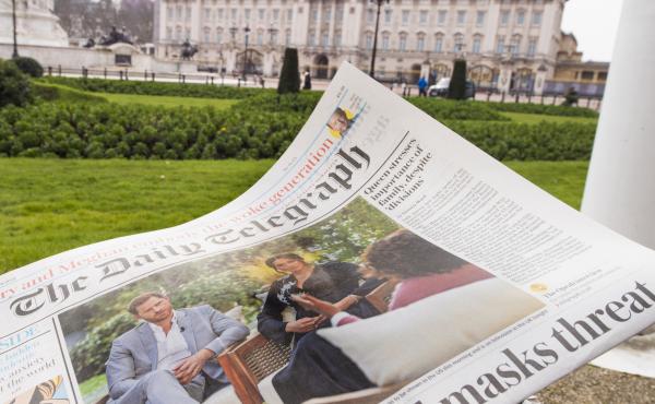 A British newspaper flutters in the wind outside Buckingham Palace in London the day after the Duke and Duchess of Sussex's interview with Oprah Winfrey. A British newspaper flutters in the wind outside Buckingham Palace in London the day after the Duke and Duchess of Sussex's interview with Oprah Winfrey.