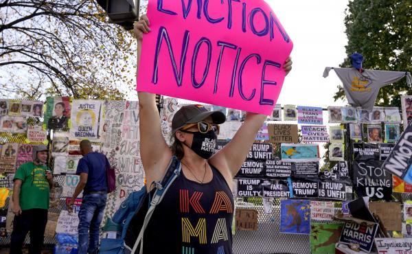 A protester holds up an eviction-related sign in Washington, D.C. The coronavirus rescue package just passed in Congress sets aside $25 billion for rental assistance and extends a CDC order aimed at preventing evictions. A protester holds up an eviction-related sign in Washington, D.C. The coronavirus rescue package just passed in Congress sets aside $25 billion for rental assistance and extends a CDC order aimed at preventing evictions.
