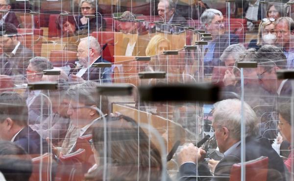 Calling COVID-19 "a terrible wake-up call," an independent review panel says national and international leaders failed to respond adequately to the pandemic. Here, members of the Bavarian state Parliament sit among clear panels in Munich in October. Calling COVID-19 "a terrible wake-up call," an independent review panel says national and international leaders failed to respond adequately to the pandemic. Here, members of the Bavarian state Parliament sit among clear panels in Munich in October.